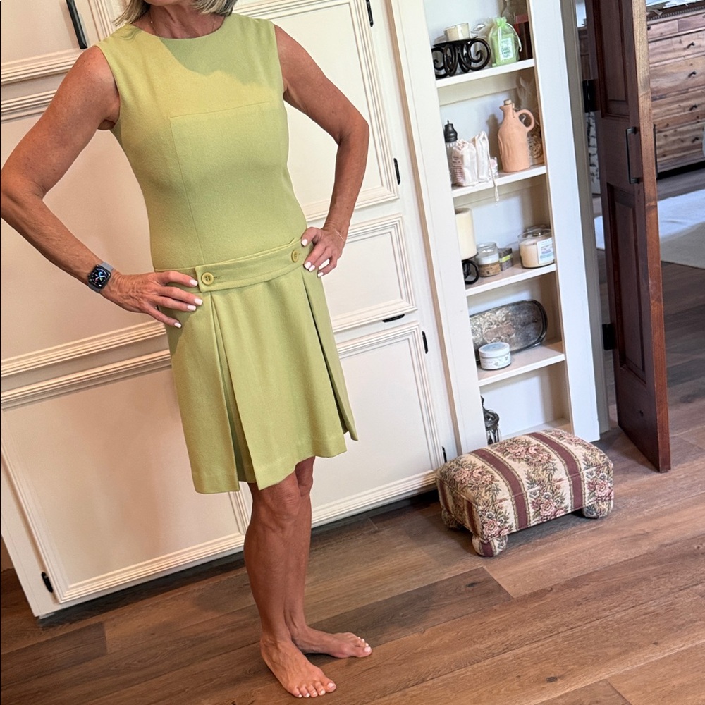 Majestic Sleeveless Green Dress with Pleated Skirt